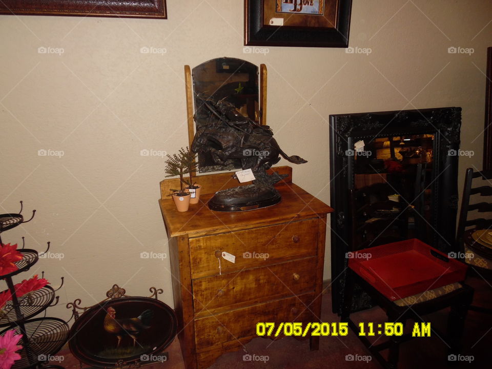 little horse 🐴 statue. This is a picture of a Indian riding a horse 🐴 that I saw while visiting a gift shop 🏪 in Graham Texas