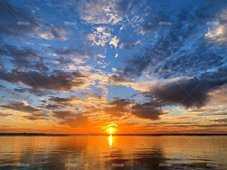 Sunset with their panoply of blues, bouquets of yellows, and bushels of oranges, move through a specified choreography as the earth passes from day to night. This is life at its finest.