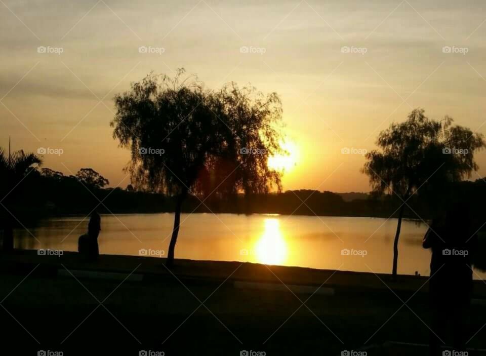 The orange sunset in Mingone's Lake, Brazil