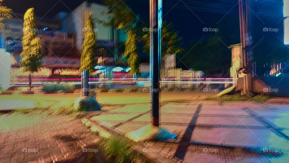 Defocused abstract background of city
street at night with street lamp lighting.
Blurred cityscape,Lighting
night at tourist attraction colorful.