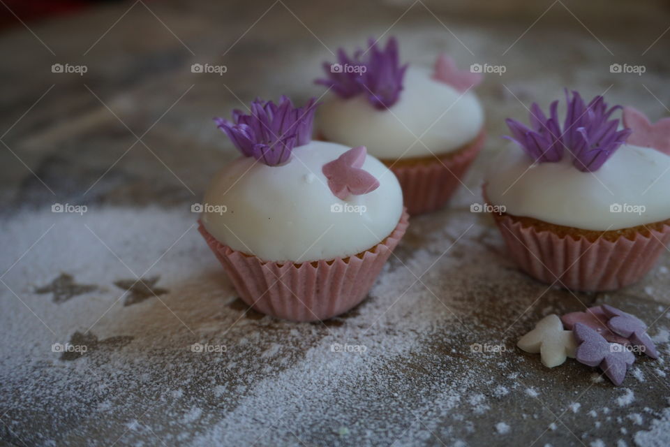 Delicious cupcake on table