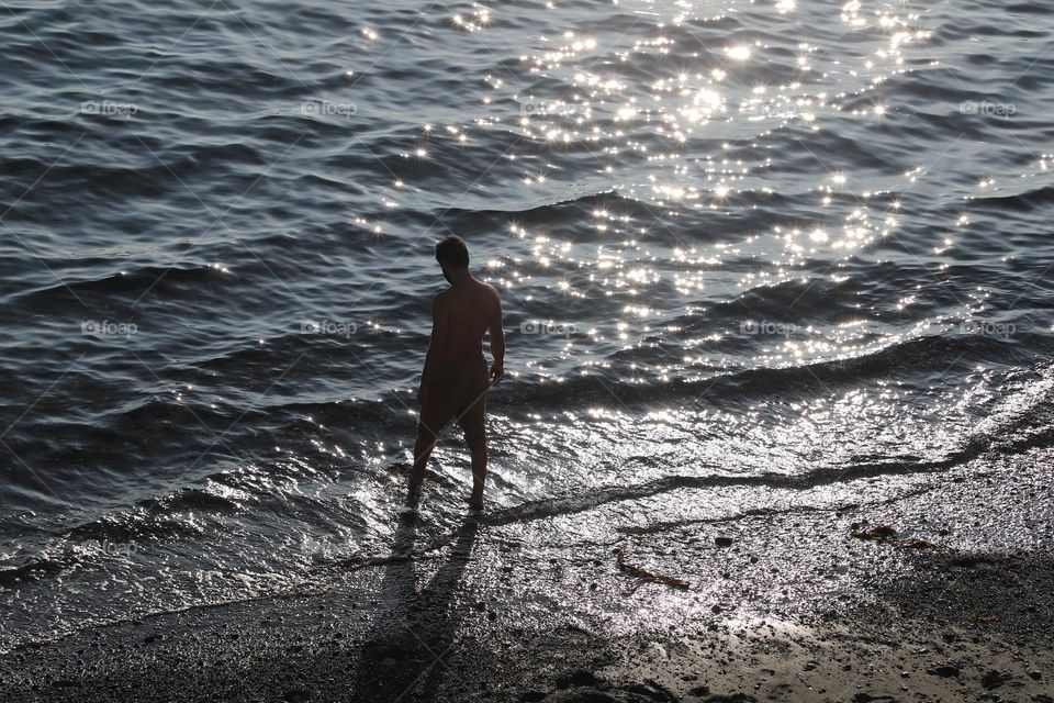 Man in shallow water 