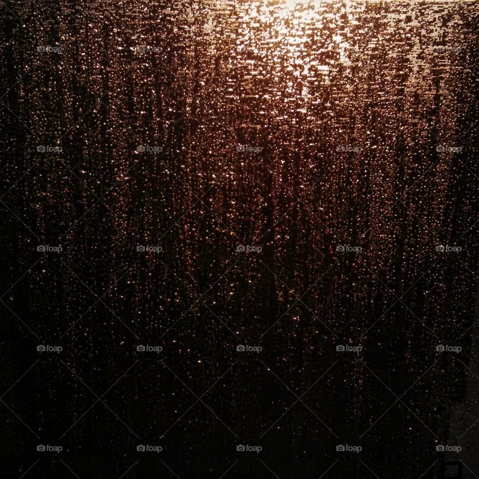 Raindrop Shimmer on Window