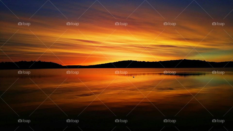 Silhouette of mountain with dramatic sky