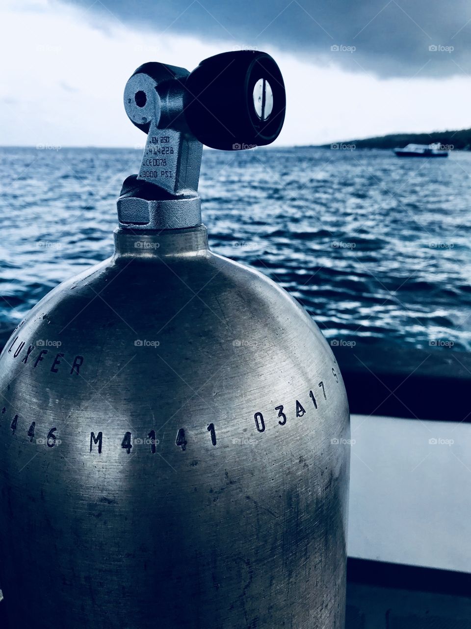 A gas Bottle for diving in a boat at the sea