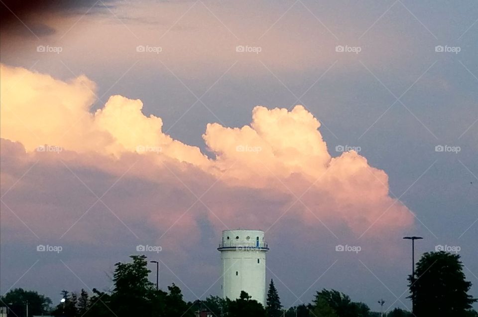 water tower and clouds