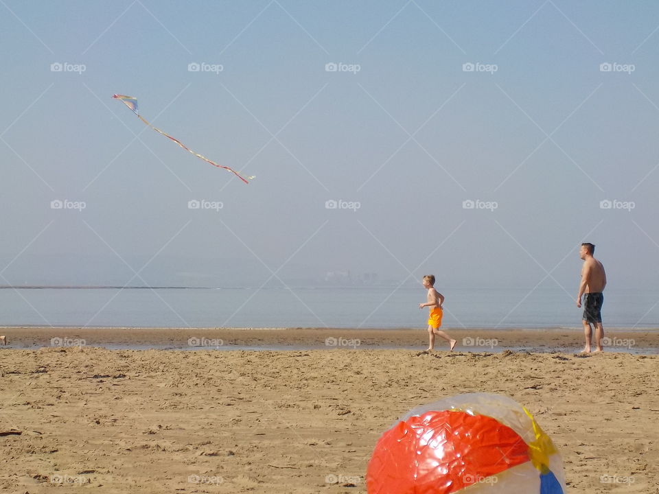 Kite boy sea & beach-ball 