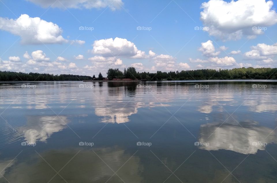 lake summer landscape and sky clouds reflection