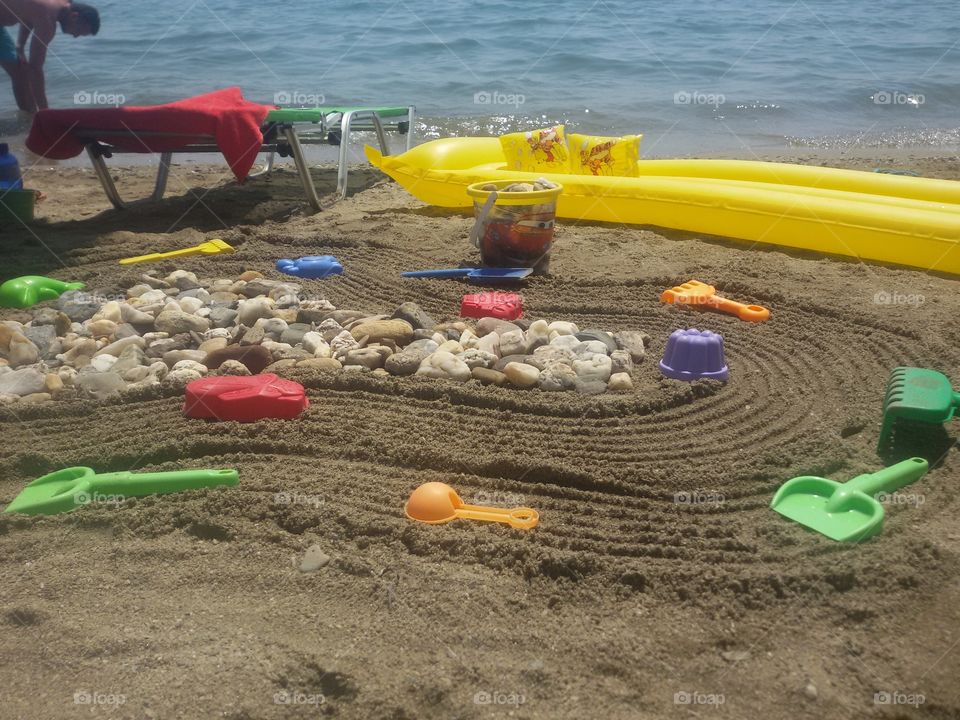 Children toys on beach