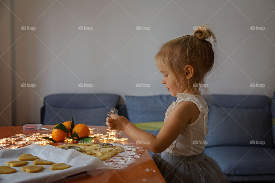 Little girl preparing snacks for Santa