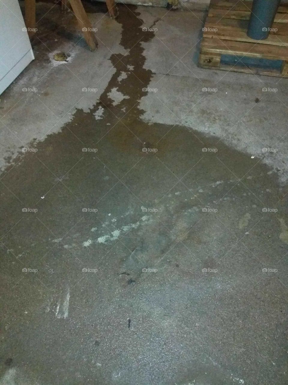 where the kitchen sink leak came down and hit the basement floor.