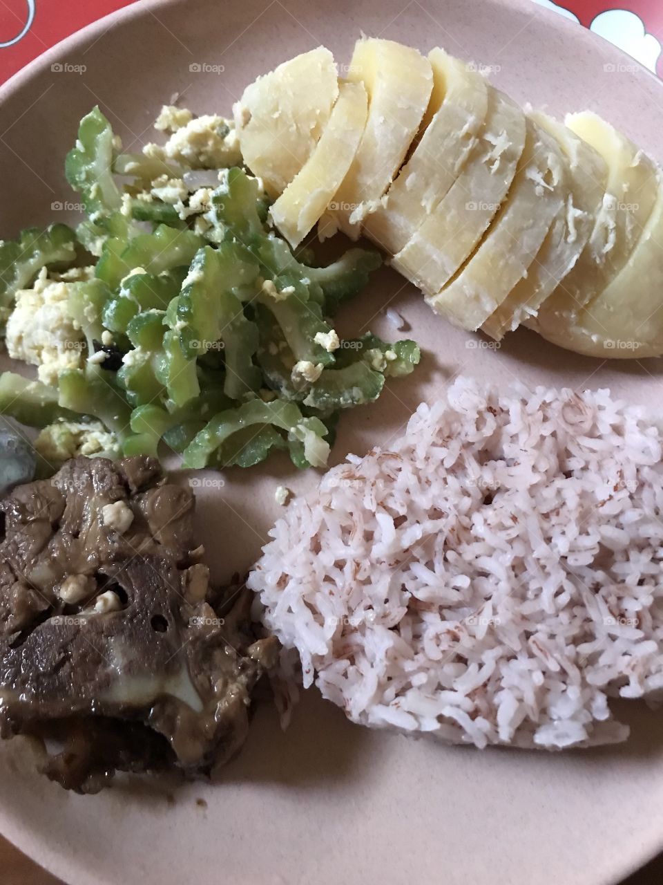 Brown rice, Saba (Plantain), Bitter Gourd, Pork. 