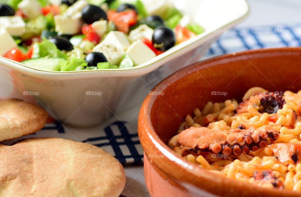 Close-up of greek food and salad