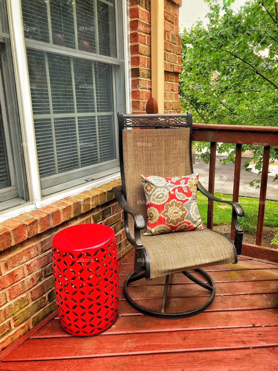 Afternoon on the deck outdoors chair decorative pillow and drum table 