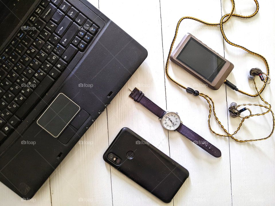 laptop, smartphone, music player, and men's mechanical watch Pobeda