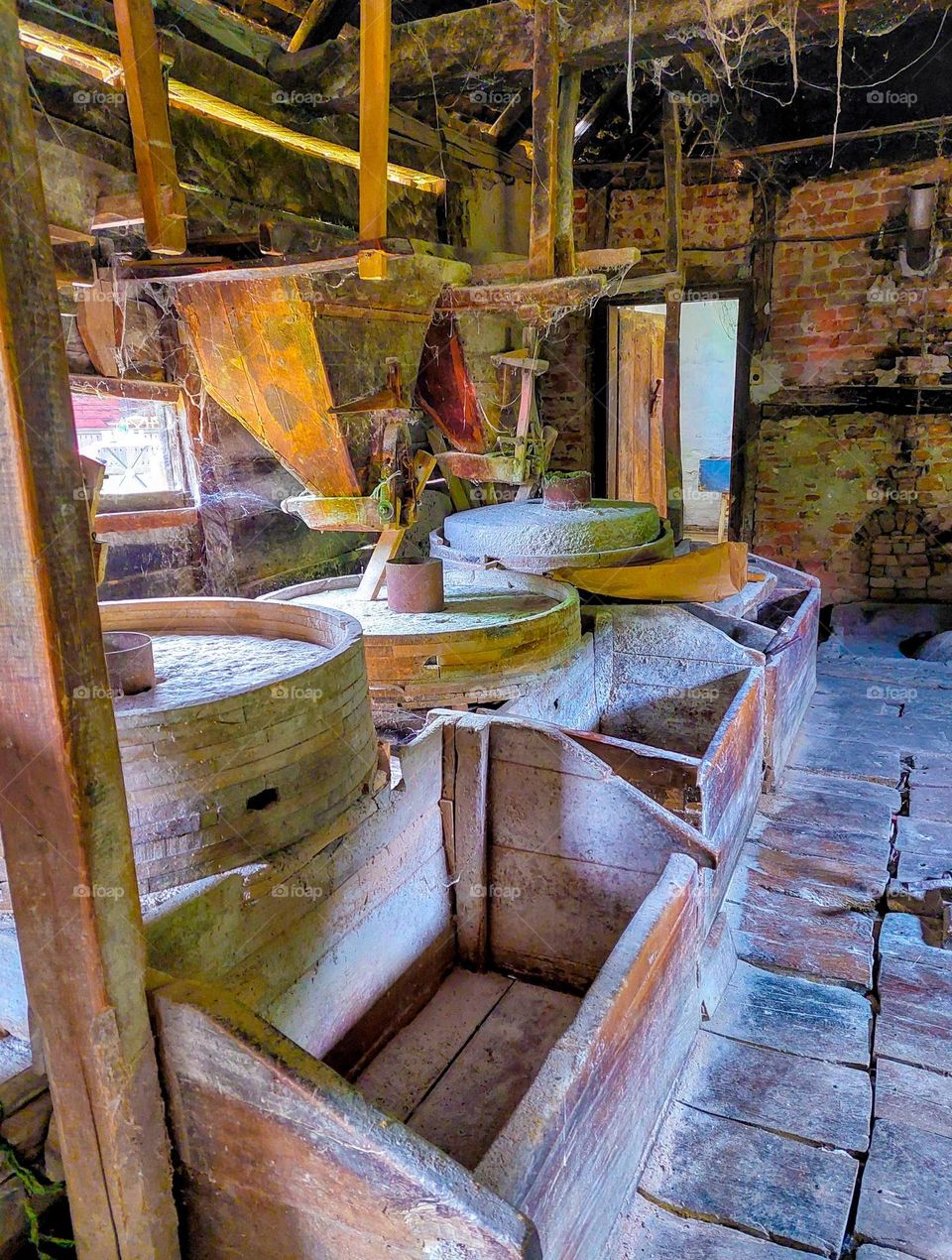 Interior inside an old wooden mill. Tools for work