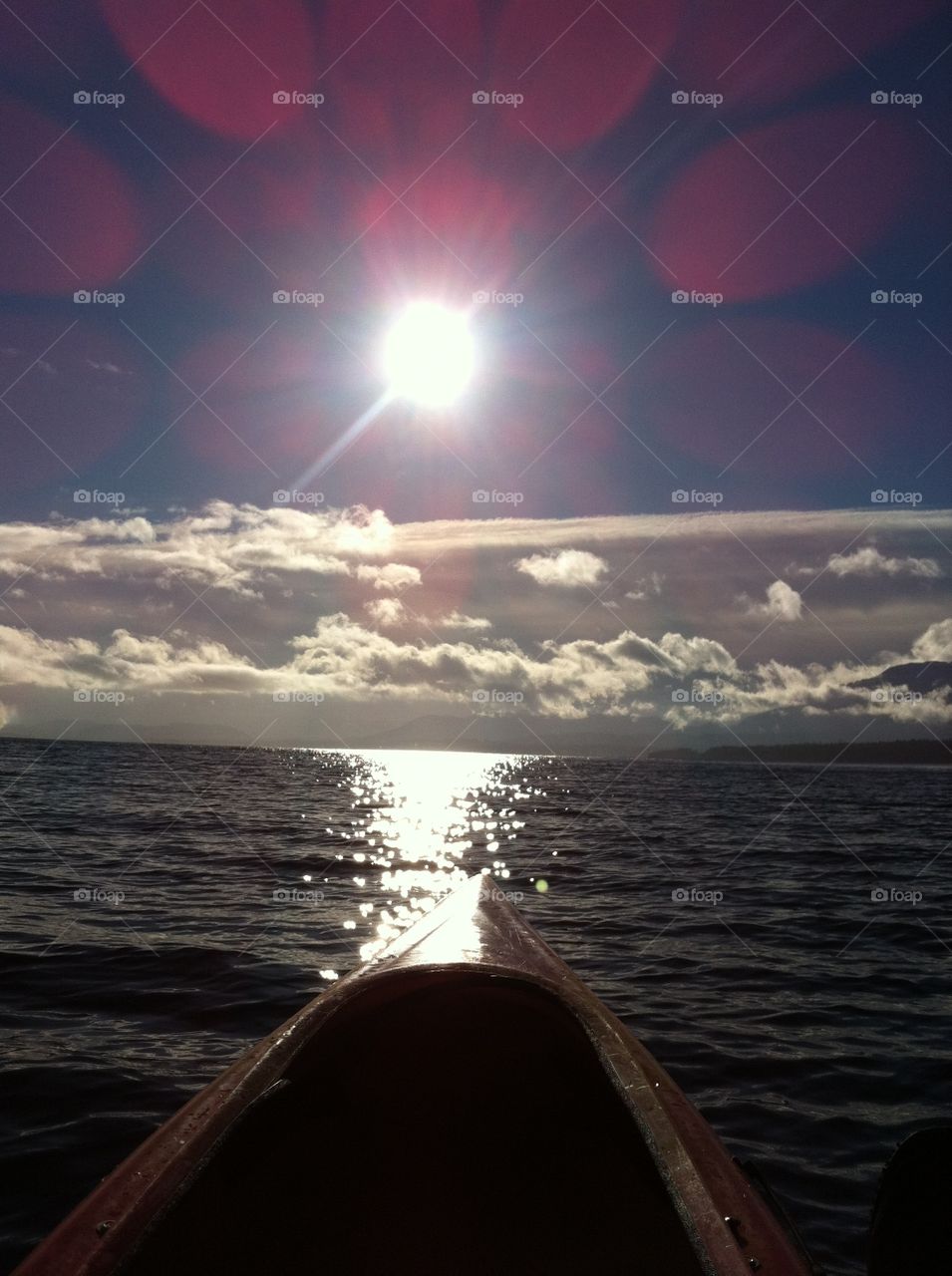 Fun in the sun. The sun shines over a evening kayak
