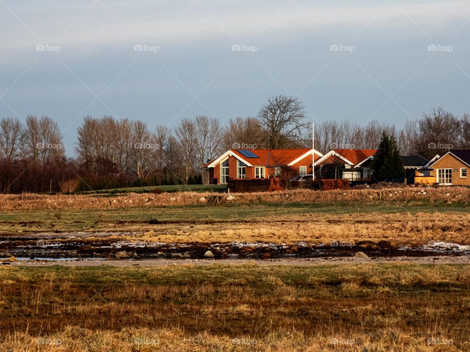 home with red roof