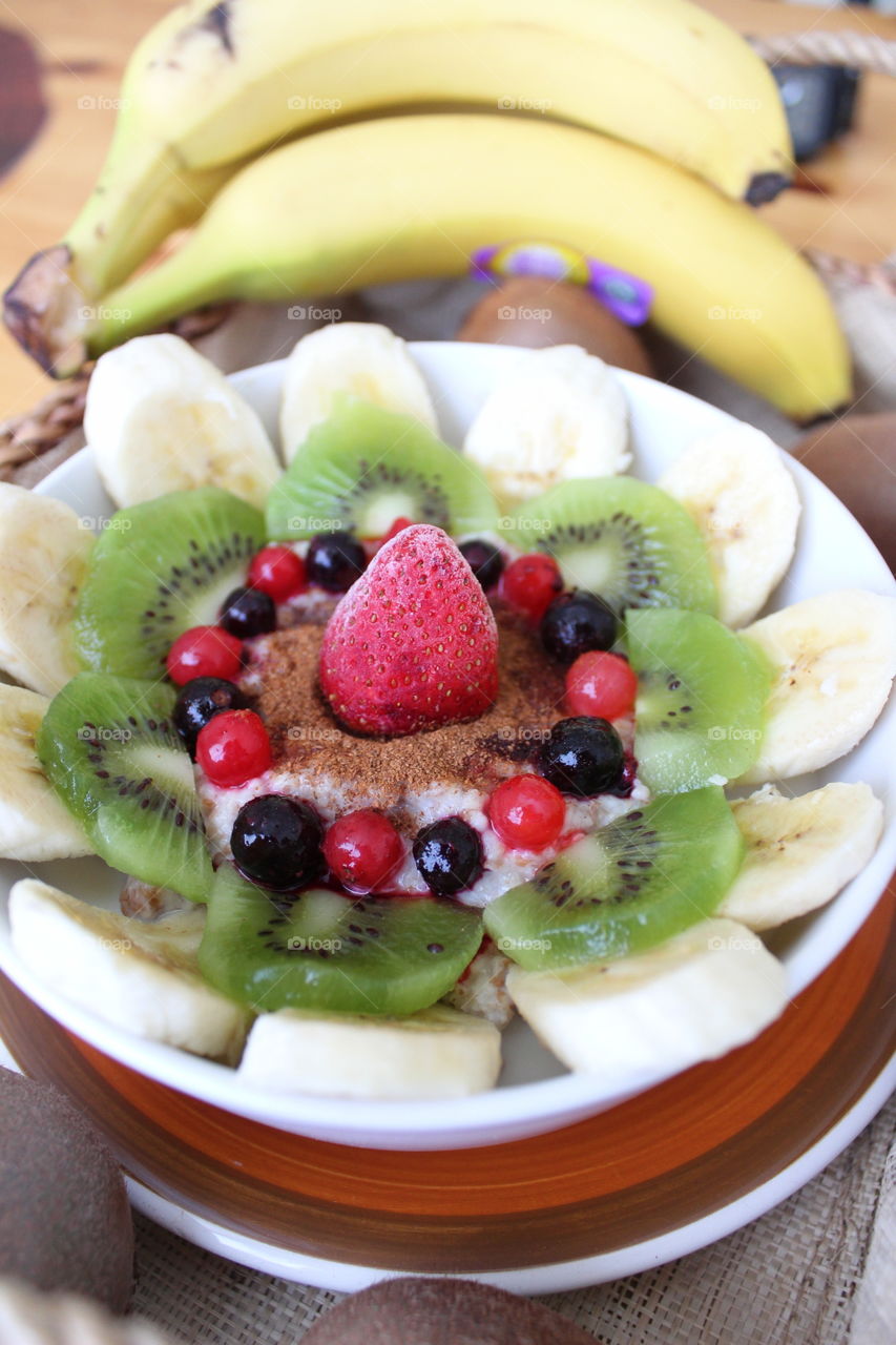 Breakfast with fruit and berries