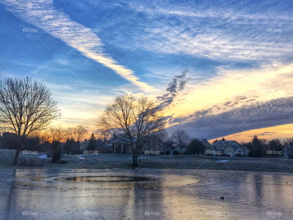 Morning over frozen pond