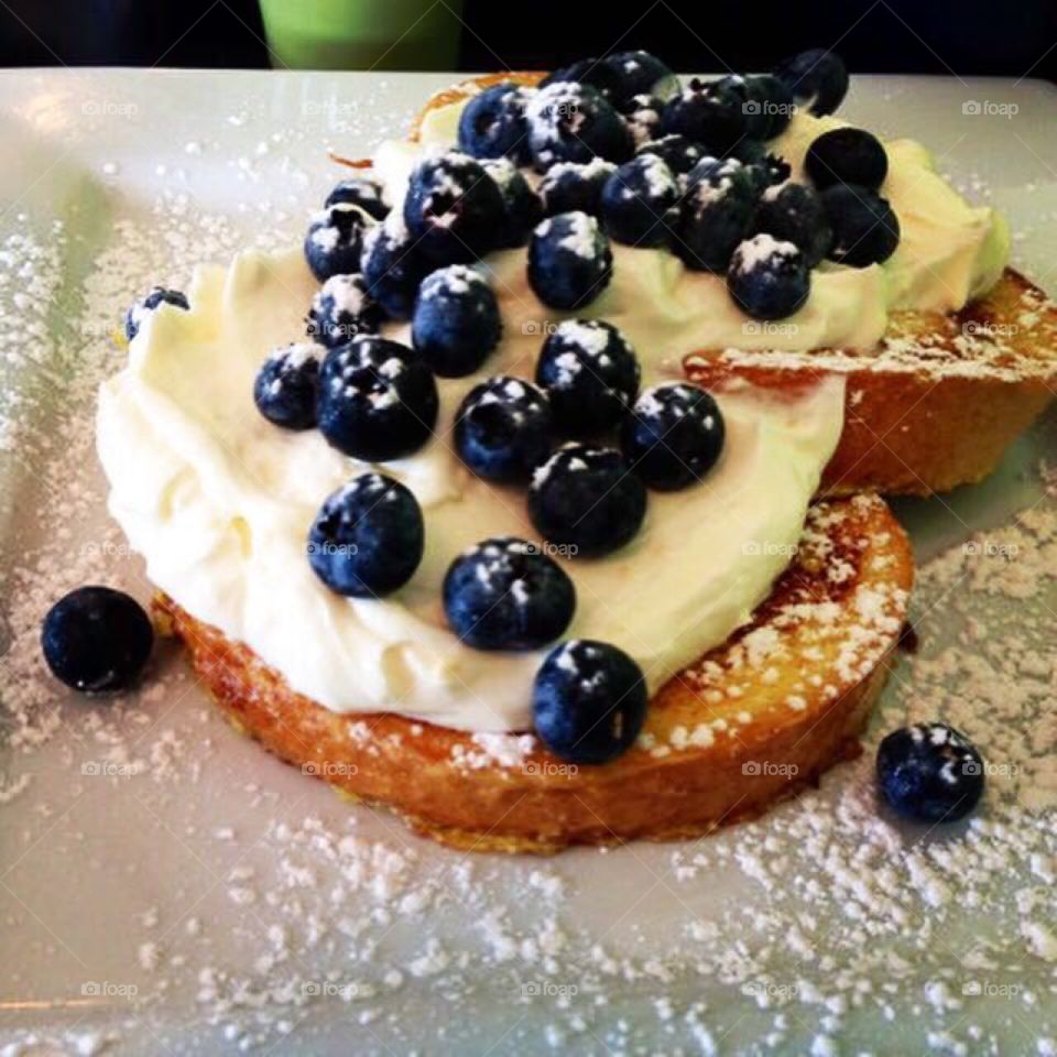 Limoncello French Toast with Blueberries. French Toast topped with limoncello Greek Yogurt & fresh blueberries. 
