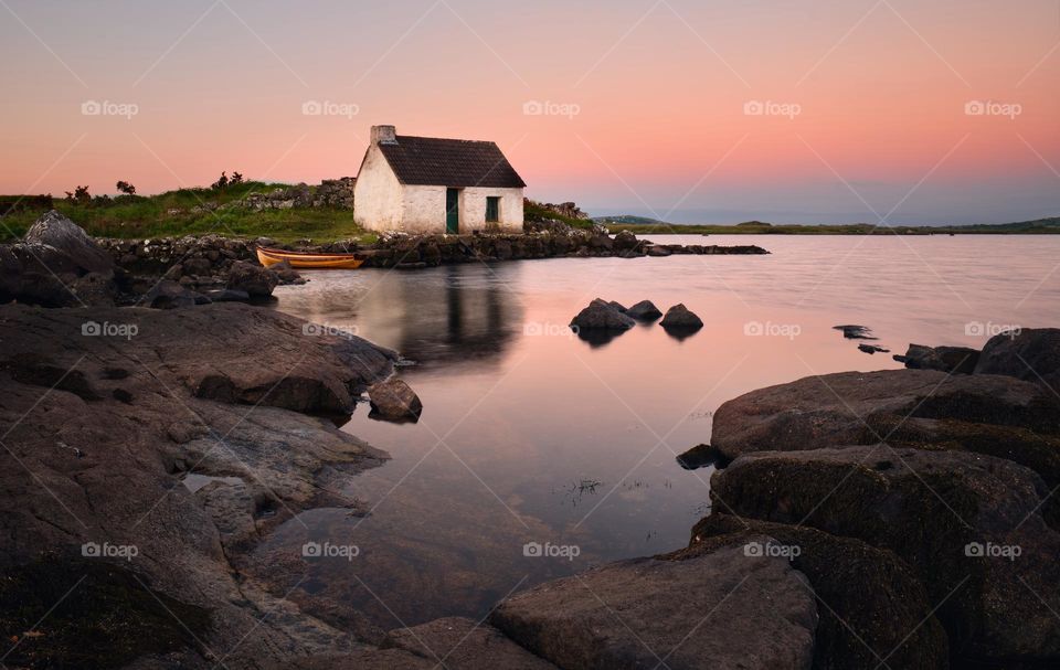 Sunrise at fisherman's hut by the lake in Screebe, connemara national Park, county Galway, Ireland