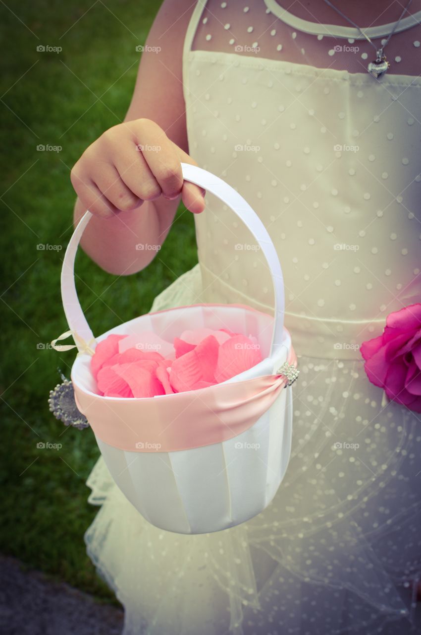 Mid section of girl holding basket