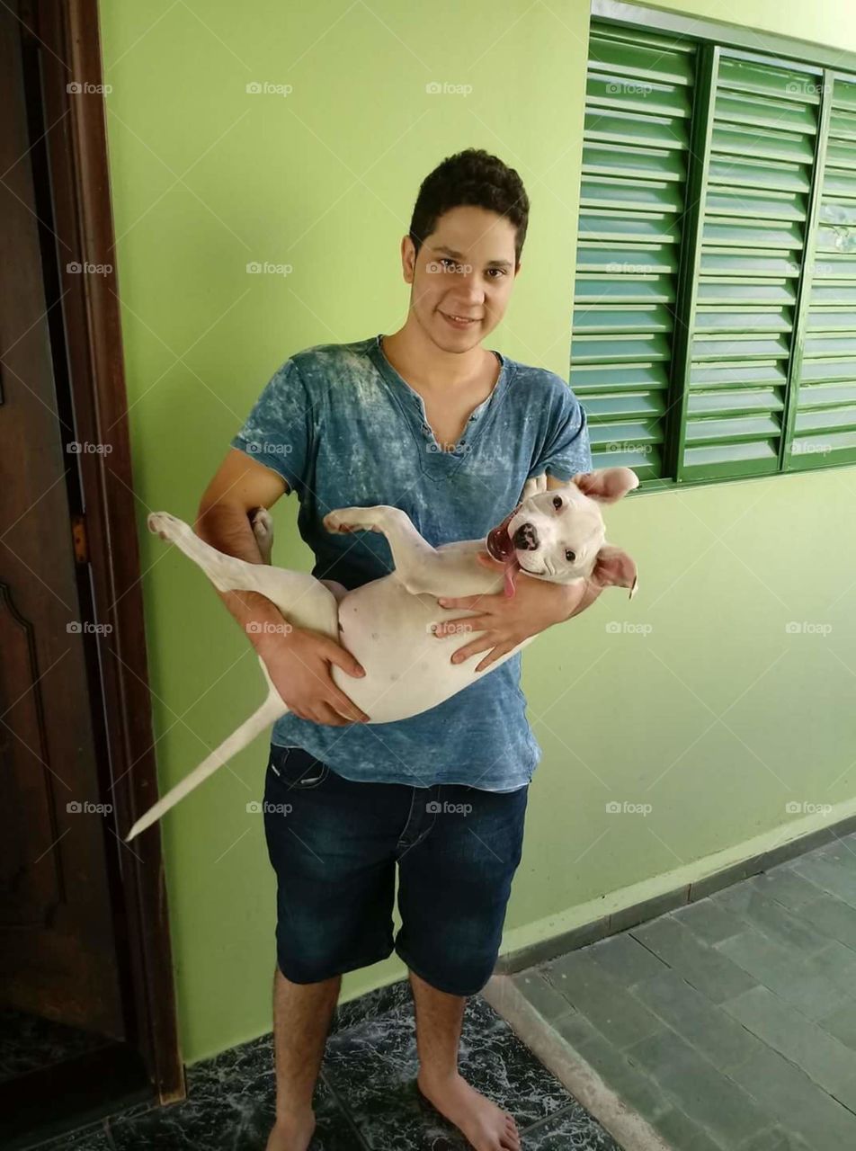 me and my pitbull 4 month so hapy smile
