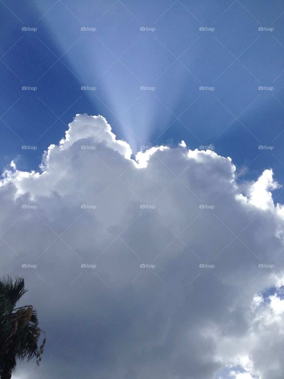 Cyprus skies - the sun trying to peek out. Looks like heaven shining through. Mr blue sky. 