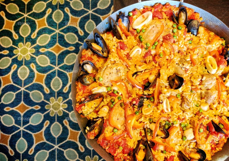 Taken off the pages of Williams and Sonoma's Rustic Spanish cookbook, this Paella is a variation of a traditional Christmas dish at my family's Christmas Eve dinner. The saffron and pimenton picante are definitely key in this dish.