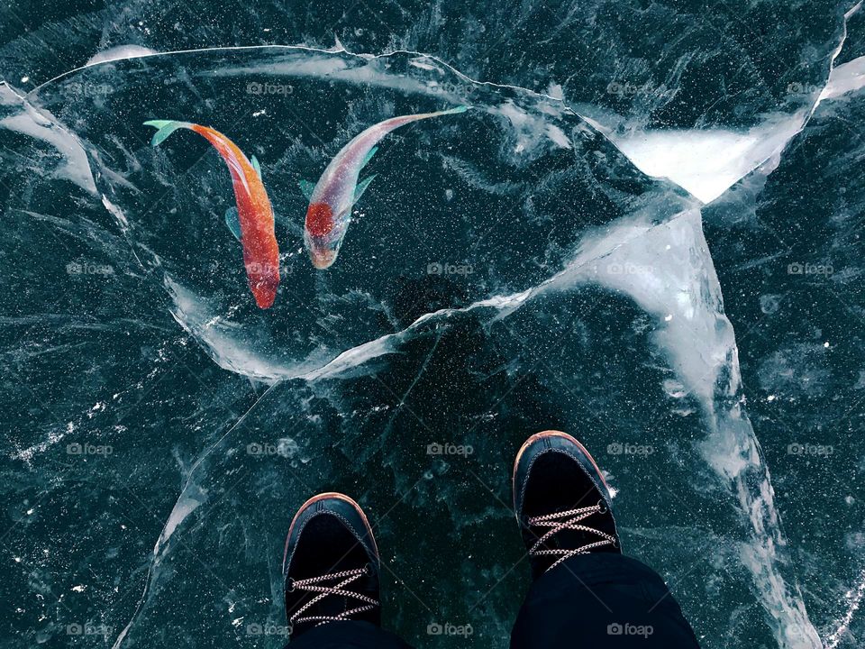 Winter weather on frozen lake 