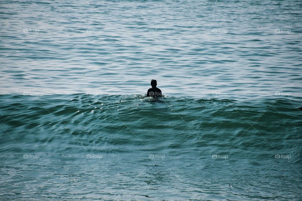 A moment of peace and silence. The vast ocean can provide such solitude 