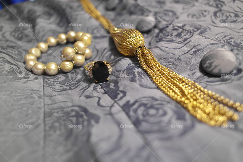 Golden jewelry on clothes