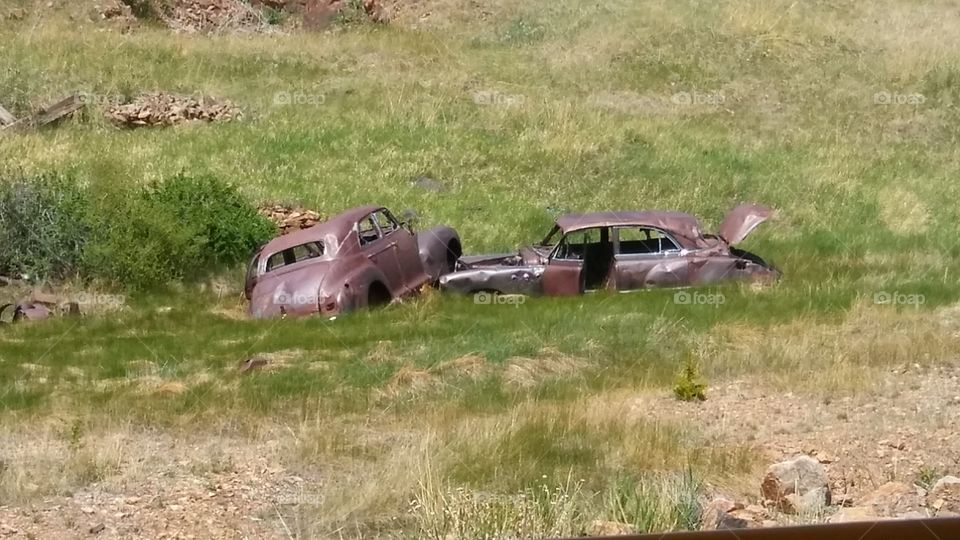 old cars in ground