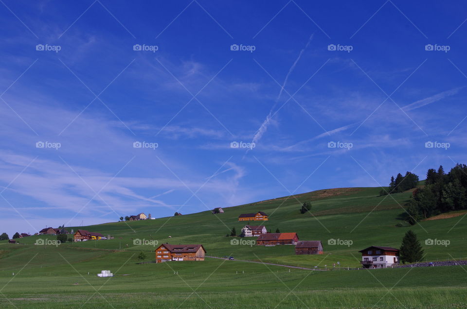 View of houses at hill