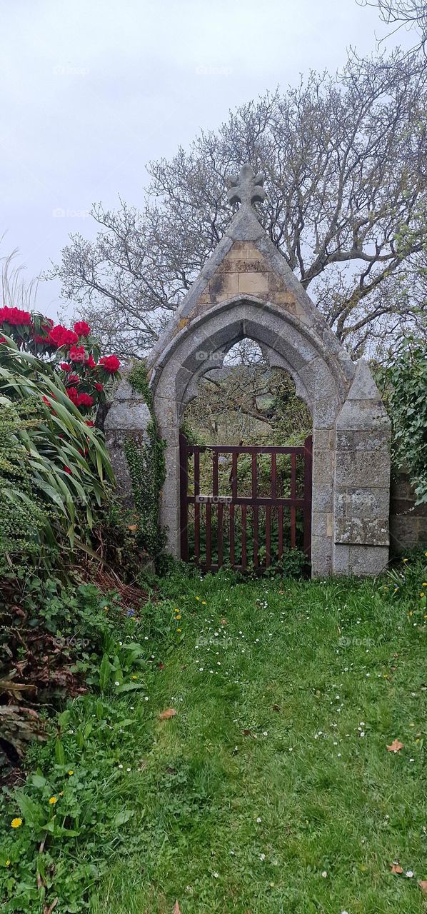 abandoned church yard arch gate
