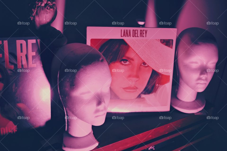 Wig heads, records and pink lights is my room.