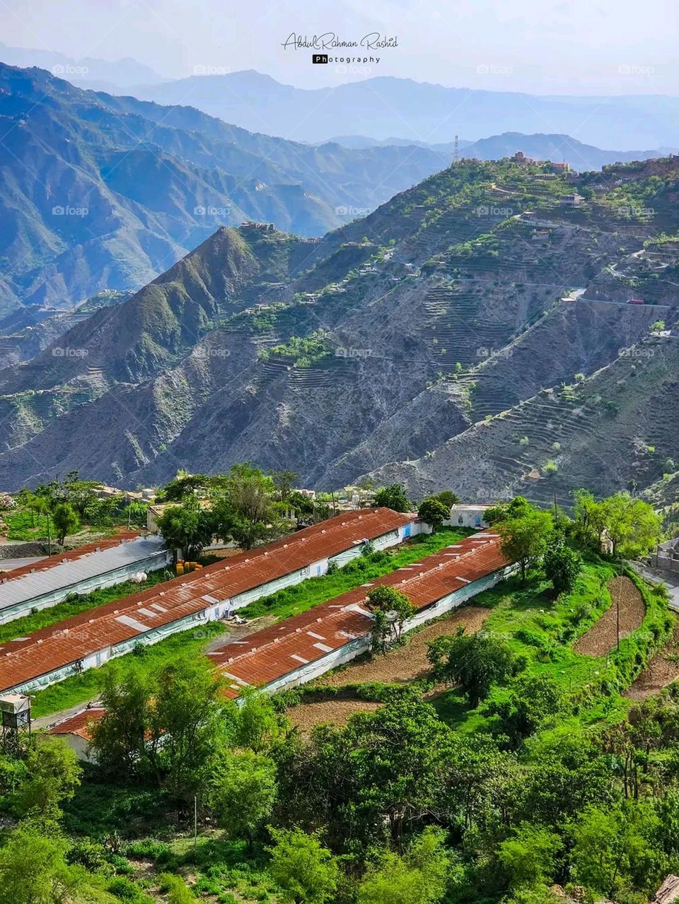 Glory be to God, the magnificent and picturesque view and the natural green trees are a view that is nothing more wonderful than it