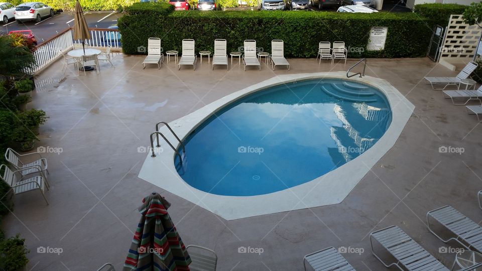 Pool with lounge chairs