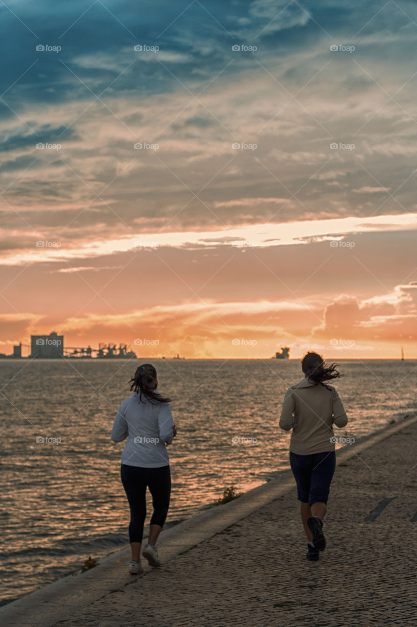 lisbon sport woman sunset by jmiguel