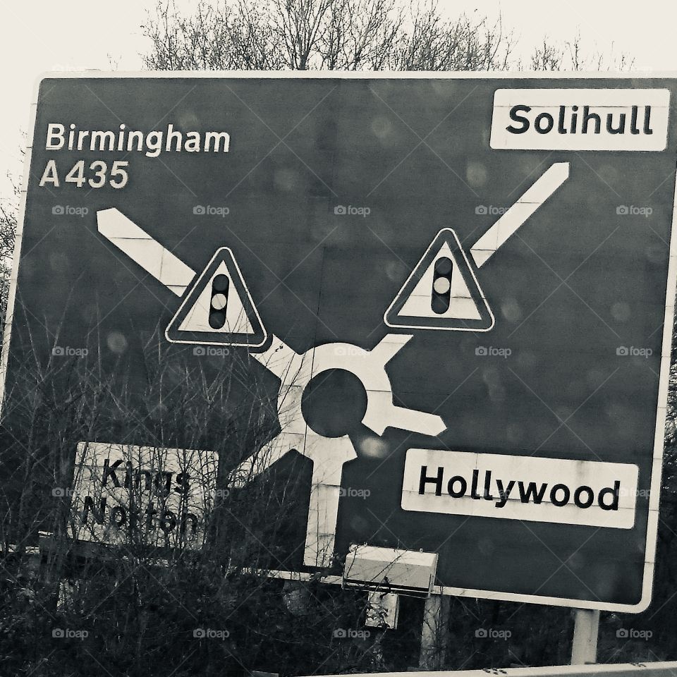 Road sign for roundabout on the A435 south of Birmingham, England. The 4th exit will take you to Hollywood. Discovered on a weekend trip in Winter, approaching the city from the M42 motorway.