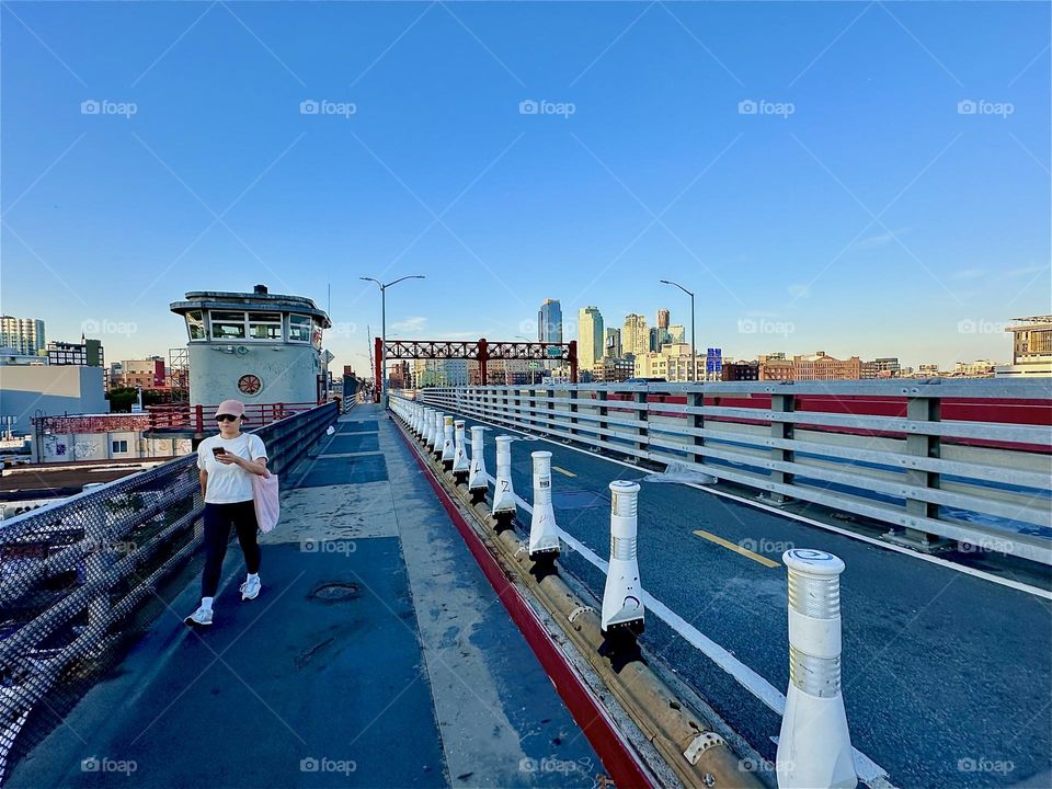 This is the aerodynamic streamlined design of the “Pulaski Bridge” at “Newtown Creek” connecting “Greenpoint”, Brooklyn to LIC, Queens in the direction we are now headed. 2024. Hypnotic Productions