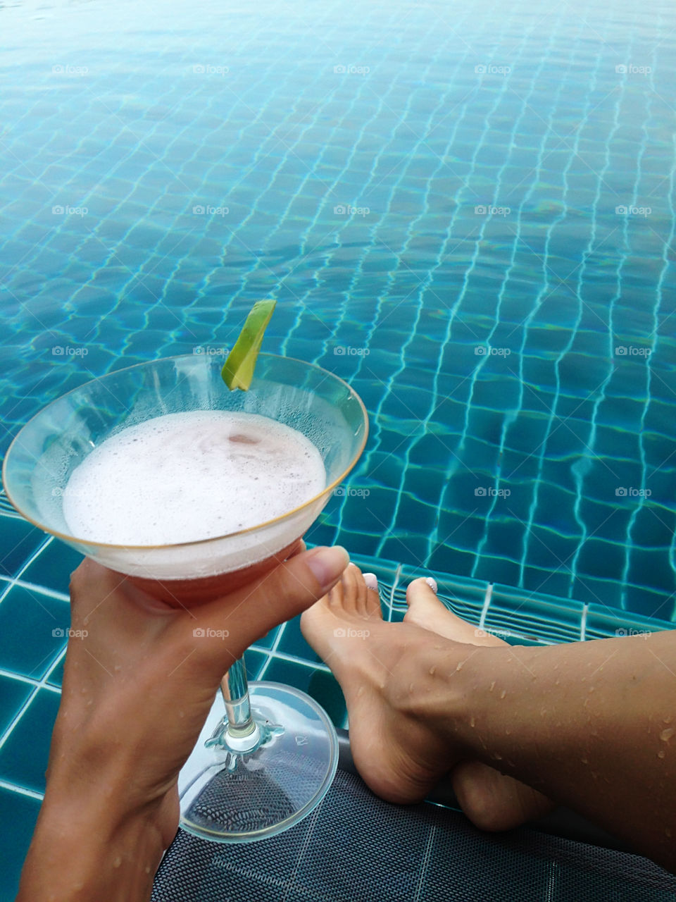 Relaxing at the swimming pool 