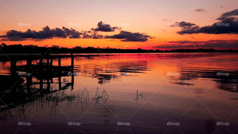 orange sunset by the dock
