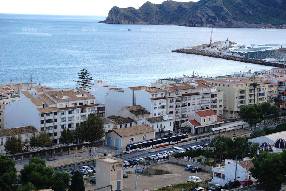 Town#view#sea#train#cars#mountains