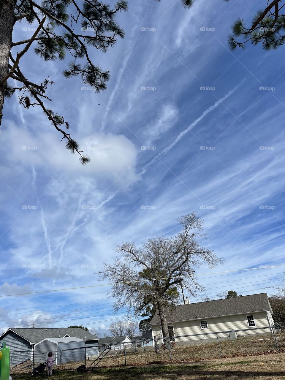  Blue sky with strange and wild clouds and streaks 