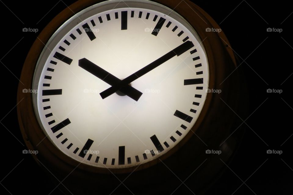 A clock at night in Munich, Germany.