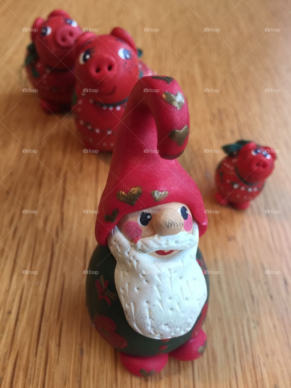 Santa and some red pigs