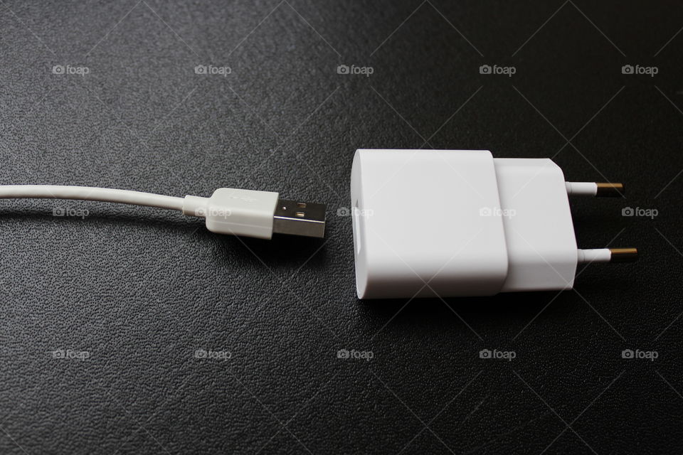 white USB cable and charger disconnected