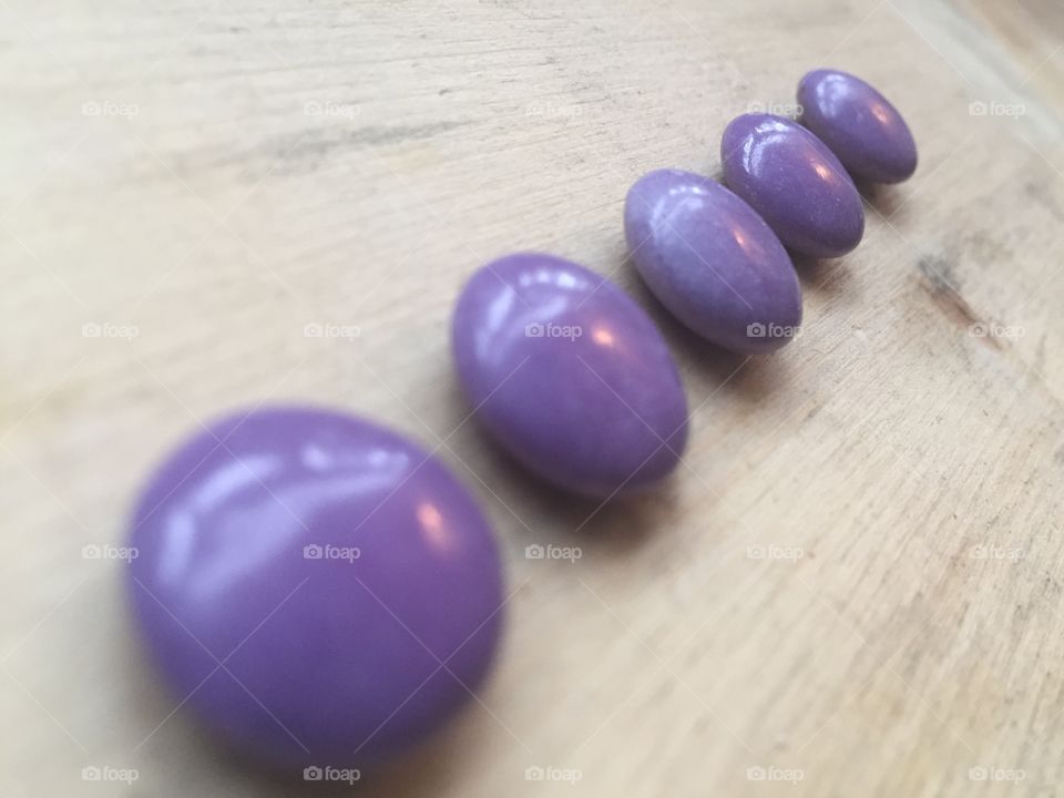 Purple candies in a row